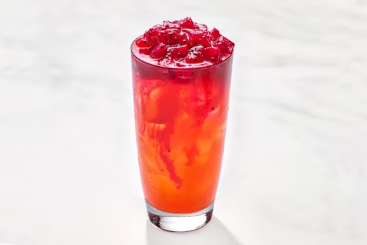 Blazing Dragon juice with strawberry, lemon, cane sugar, and dragon fruit.