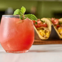 First-Watch-Seasonal-Menu 6 Spiked-Watermelon-Wake-Up-drink-from-First-Watch-with-mint-garnish-and-refreshing-flavors